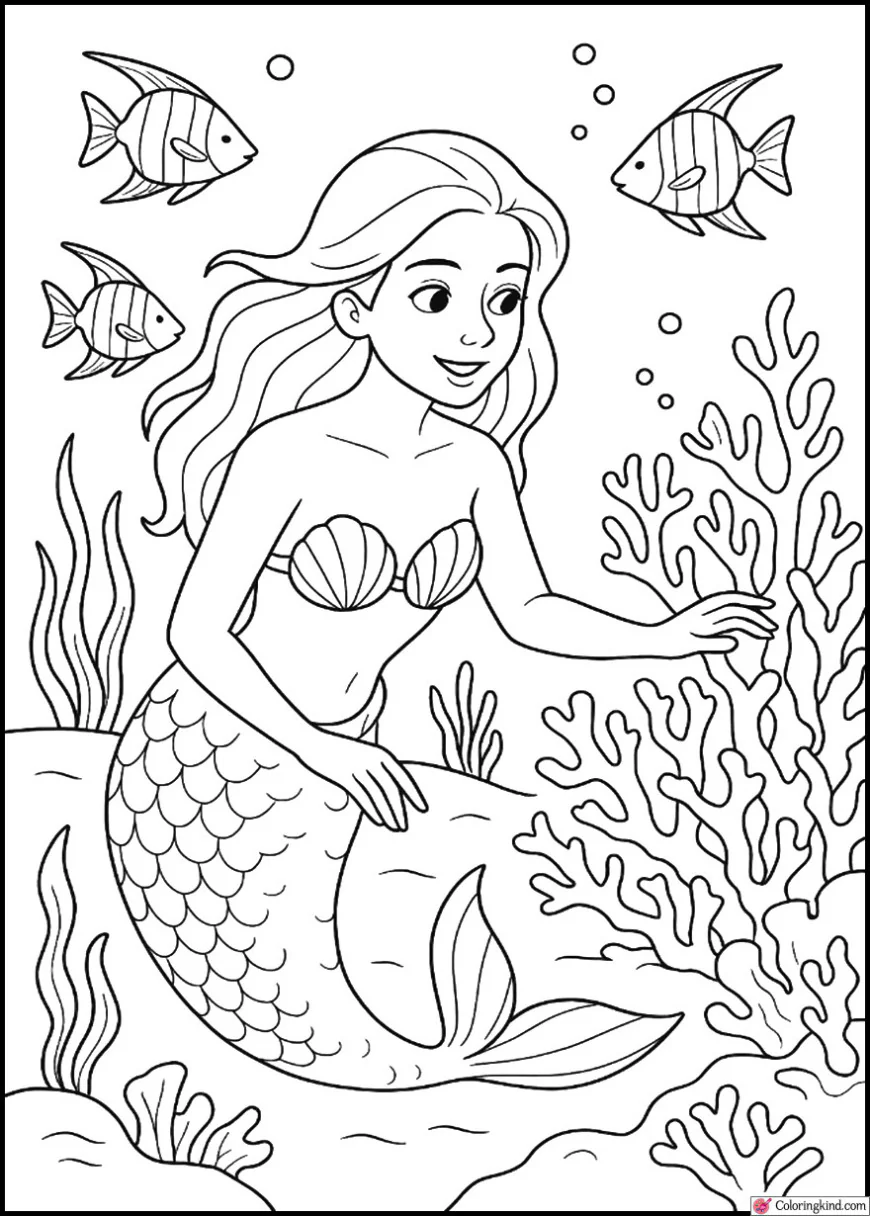 The Mermaid exploring coral reef with colorful fish